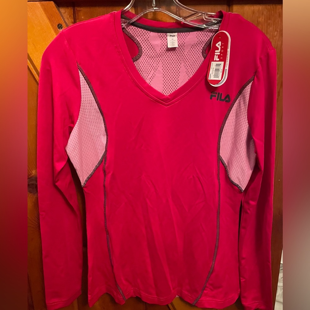 Fila athletic top long sleeve. Breathable material. Size medium women’s. NWT